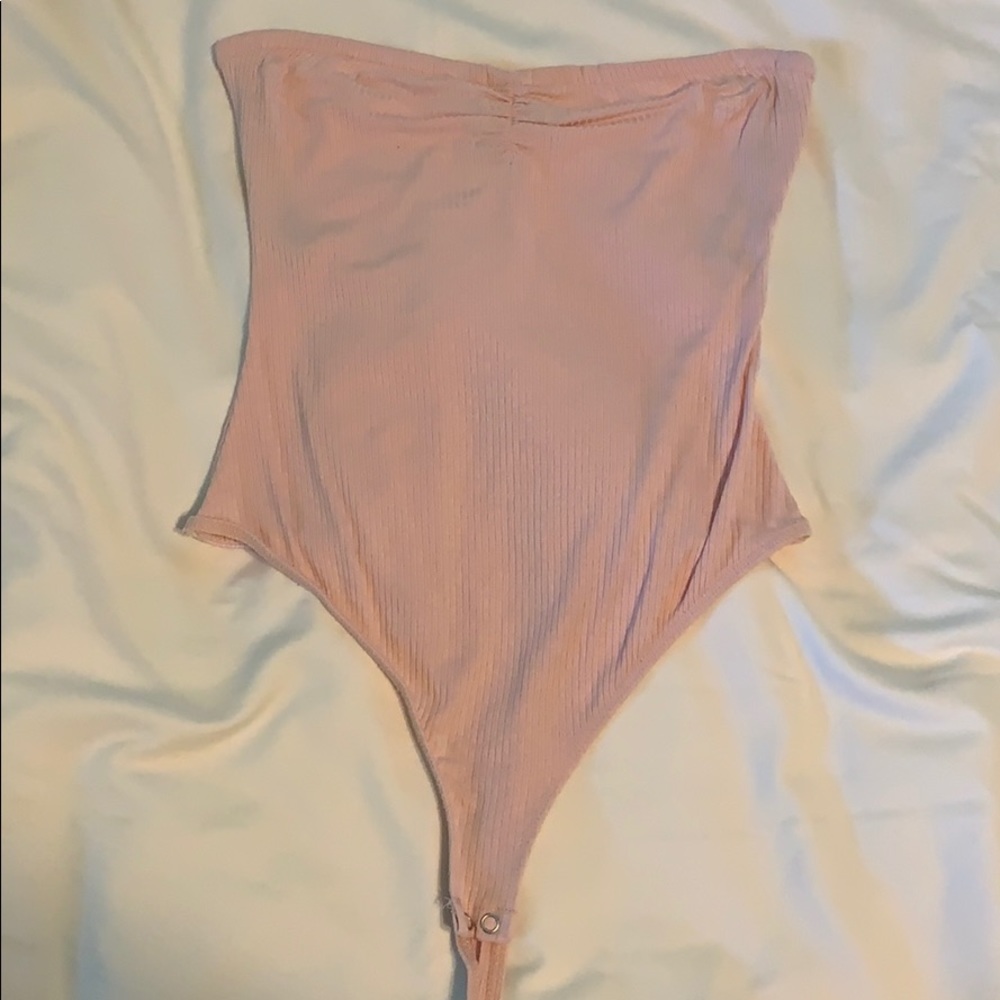 Light pink body suit